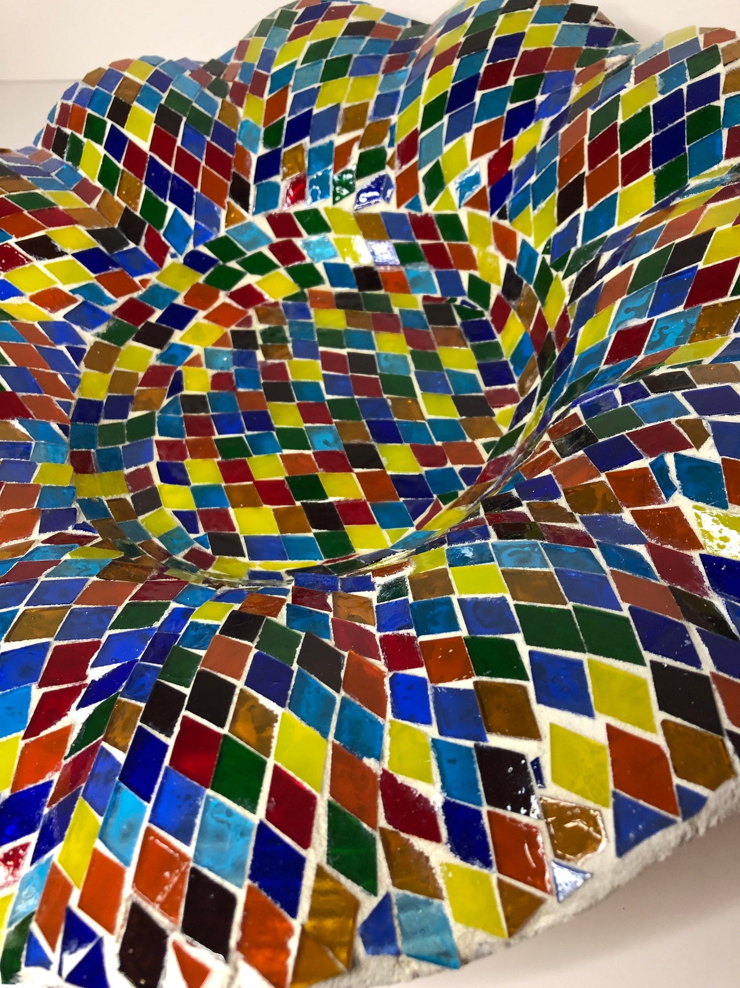 Mosaic Glass Bowl. Multicolored glass tiles on wave cut glass bowl.