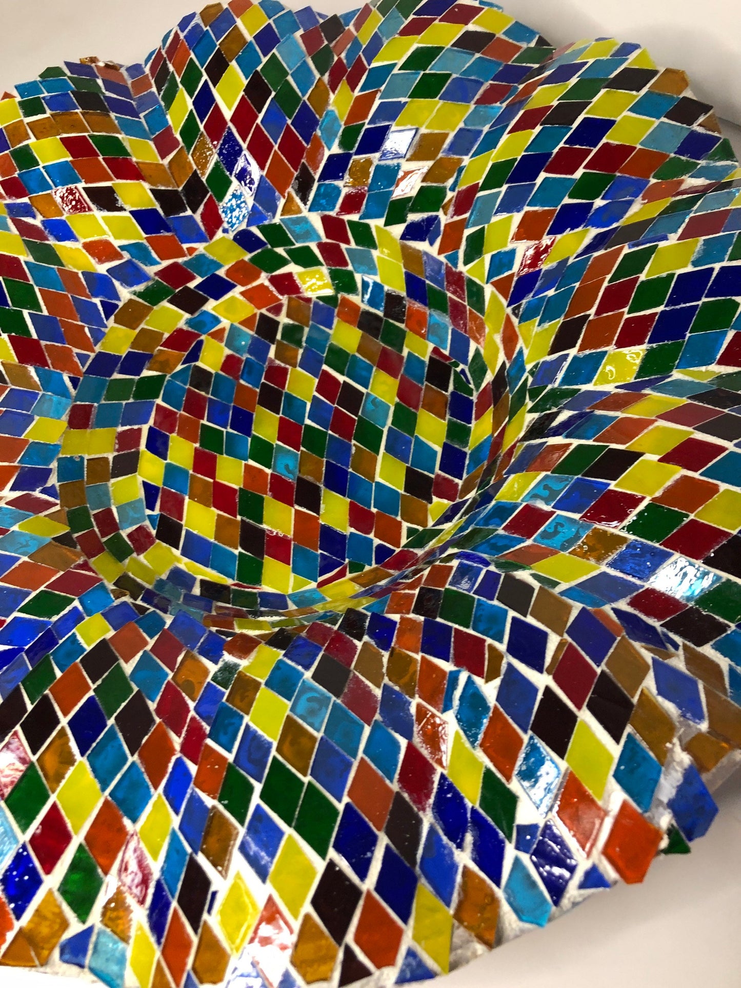 Mosaic Glass Bowl. Multicolored glass tiles on wave cut glass bowl.