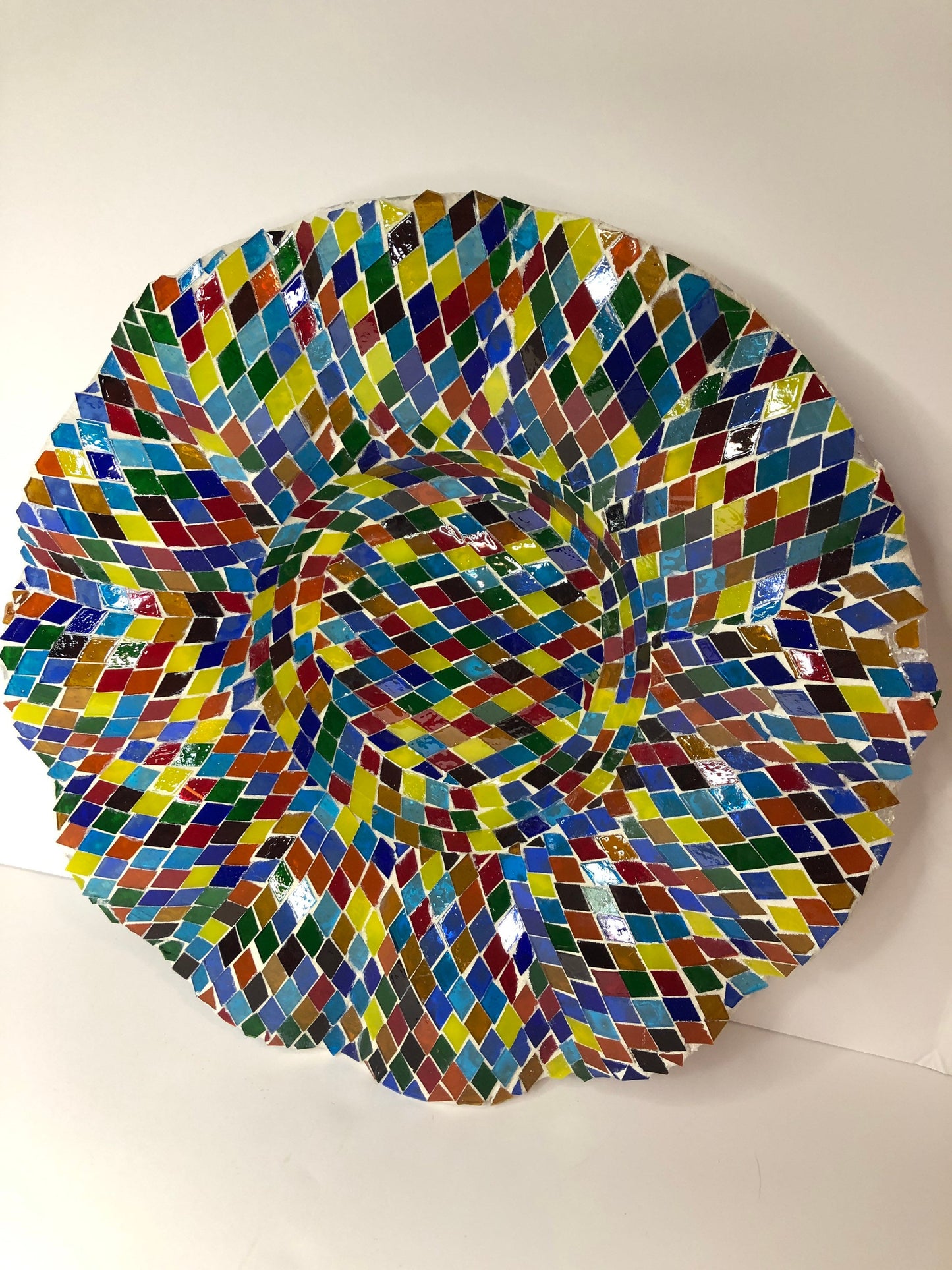 Mosaic Glass Bowl. Multicolored glass tiles on wave cut glass bowl.